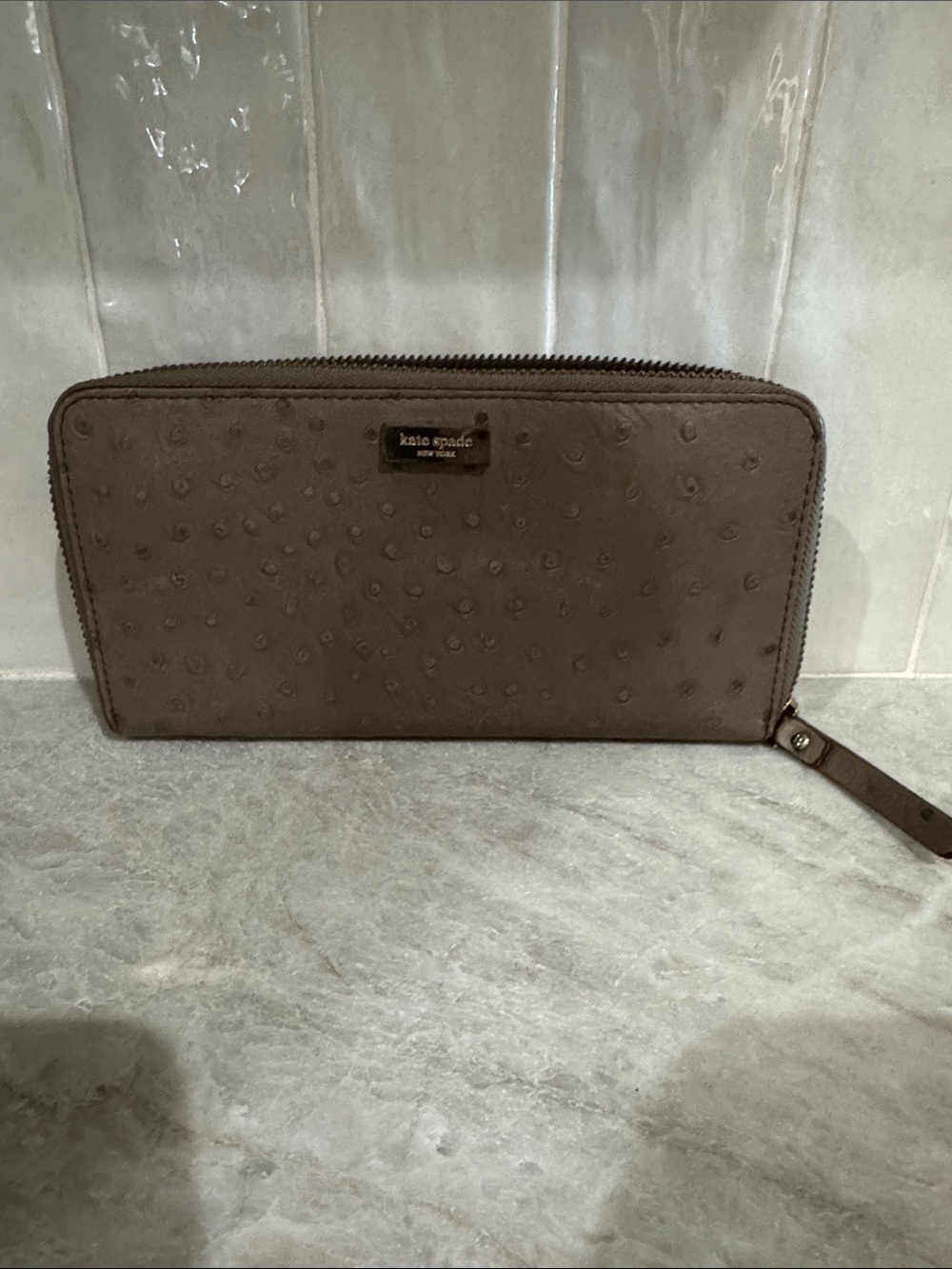 kate spade taupe ostrich-embossed zip wallet with wristlet